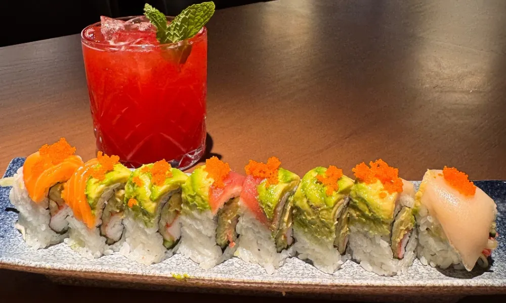 Avocado sushi roll with fish roe and assorted fish toppings at Machi Sushi, an Asian Restaurant in Houston